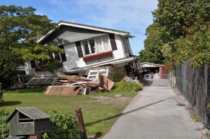 A two story house collapses during a 6.2 magnitude earthquake